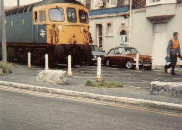 Down Train going from Weymouth Station along Commercial Road and down to the harbourside